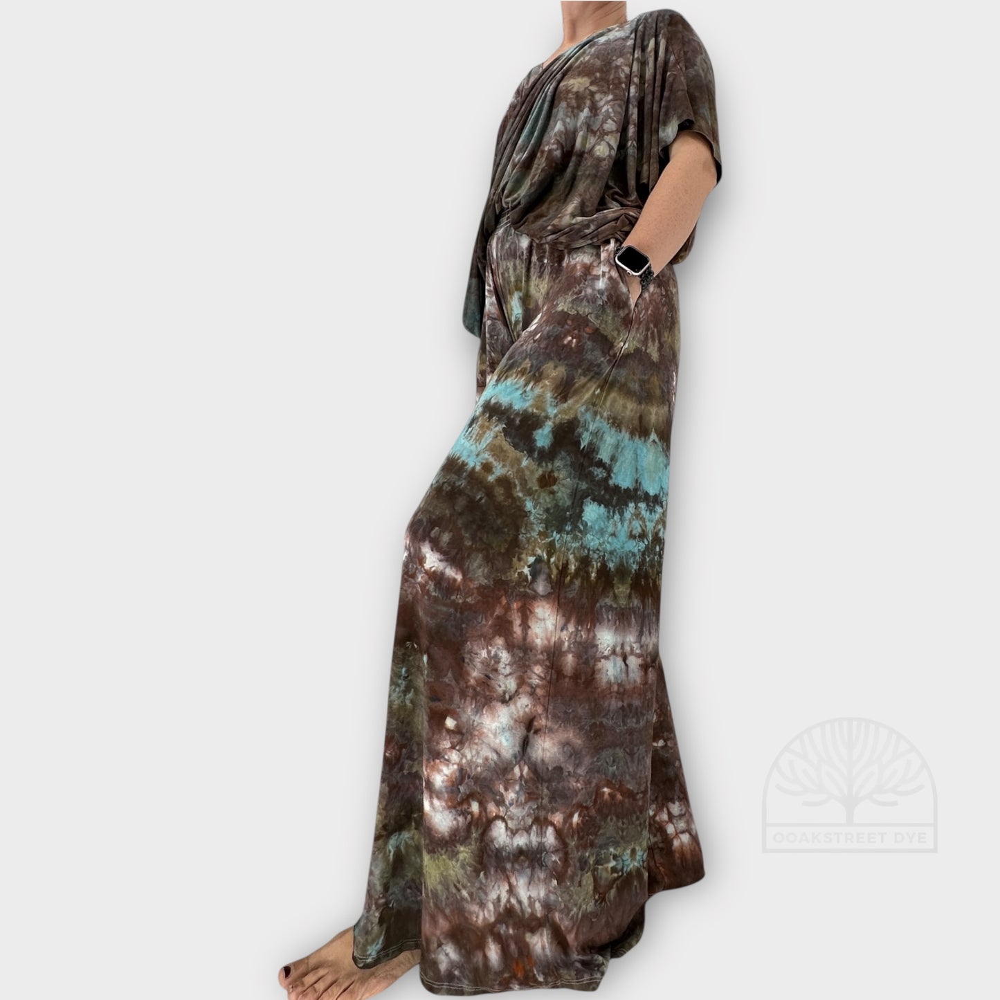 Bronzite tie-dye palazzo pant and twist top set in earthy bronze, charcoal, olive, and subtle blue tones