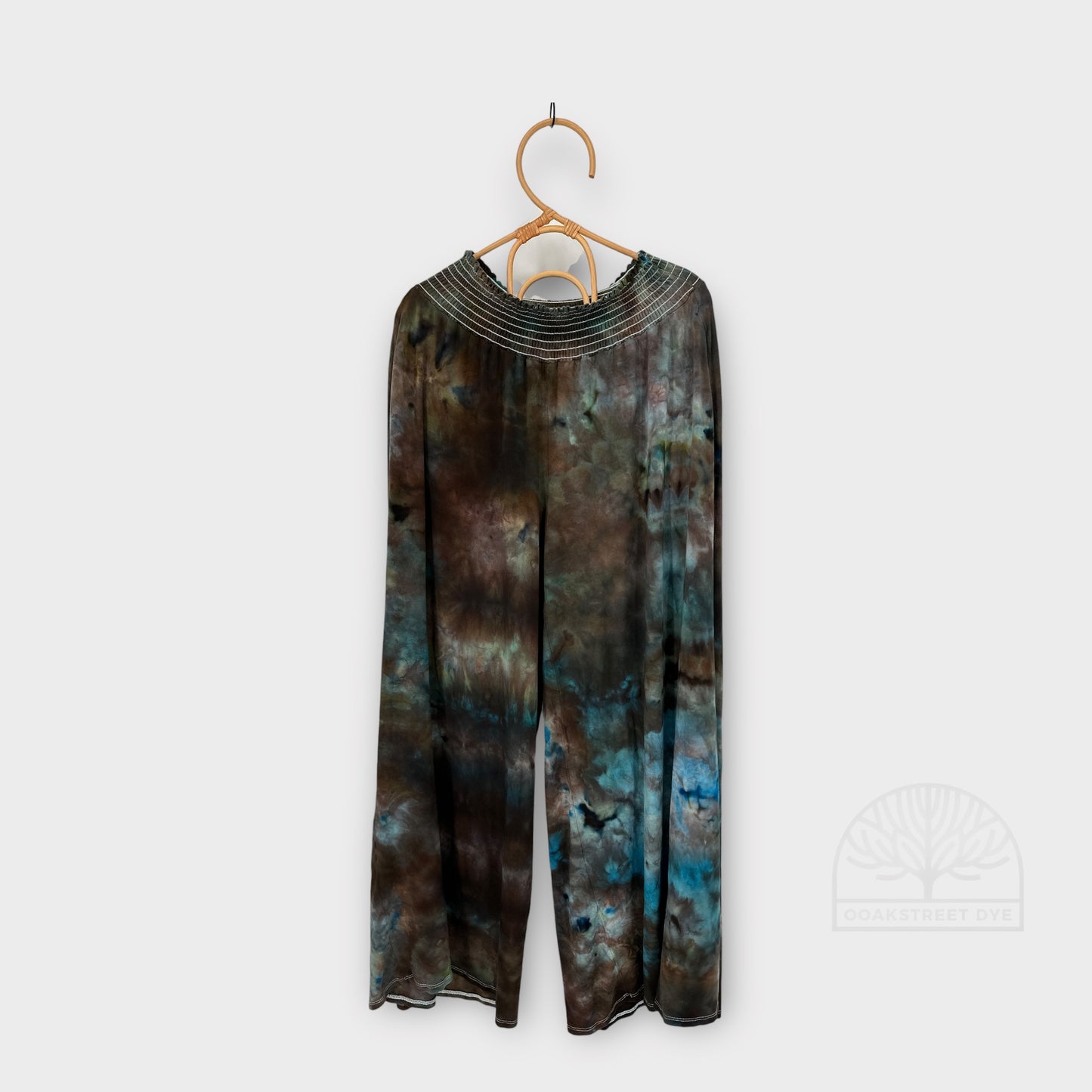 Bronzite colorway inspired by raw bronzite stone, featuring layered bronze, charcoal, olive, and muted blue tones. Hand-dyed in small batches for natural variation.
