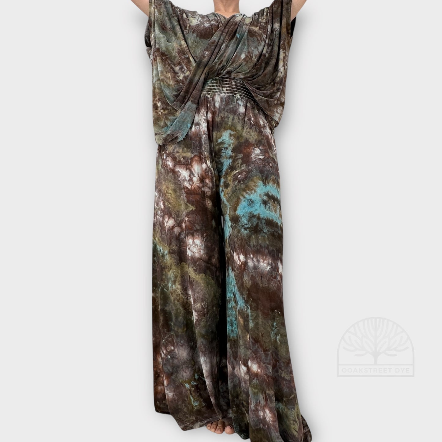 Bronzite tie-dye palazzo pant and twist top set in earthy bronze, charcoal, olive, and subtle blue tones