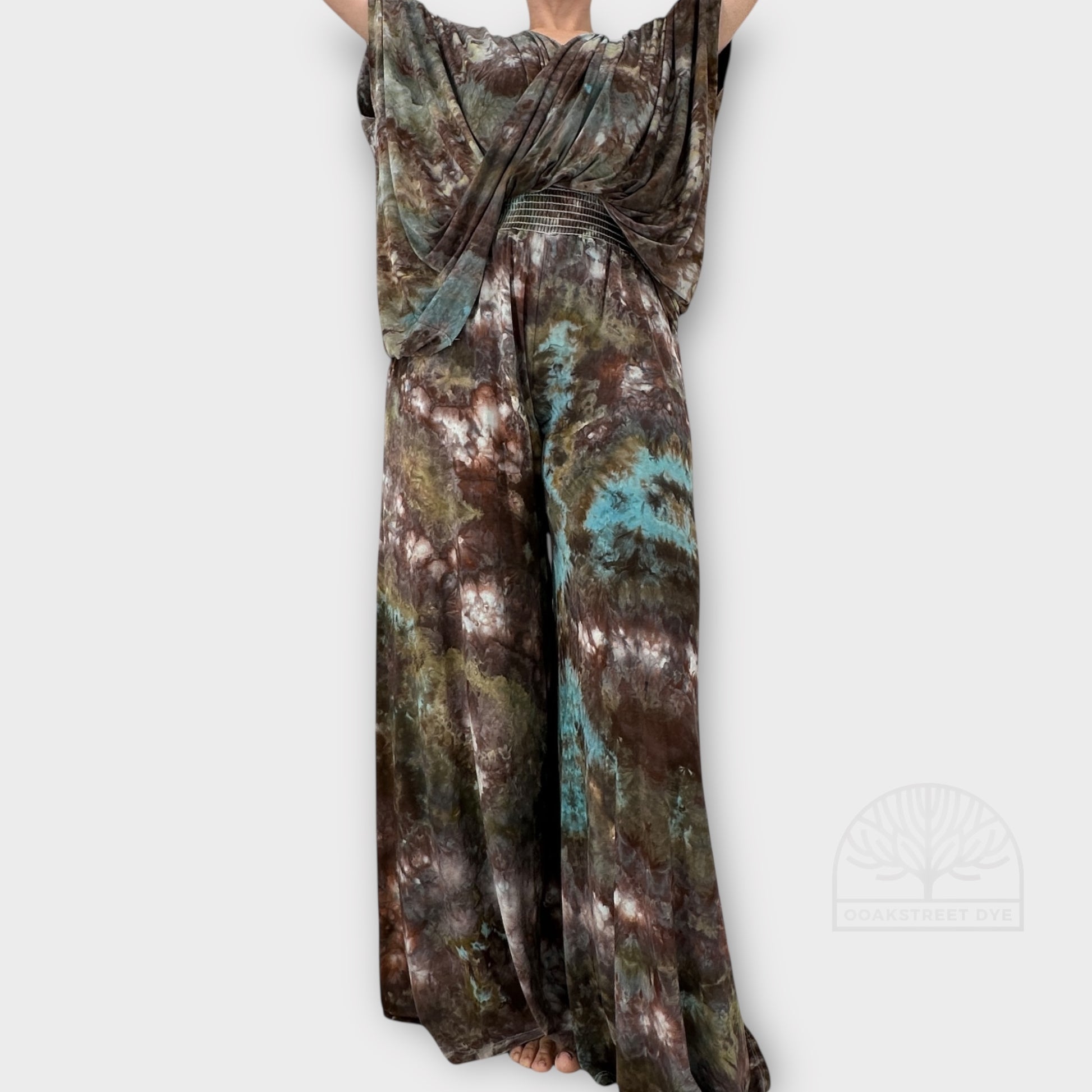 Bronzite tie-dye palazzo pant and twist top set in earthy bronze, charcoal, olive, and subtle blue tones