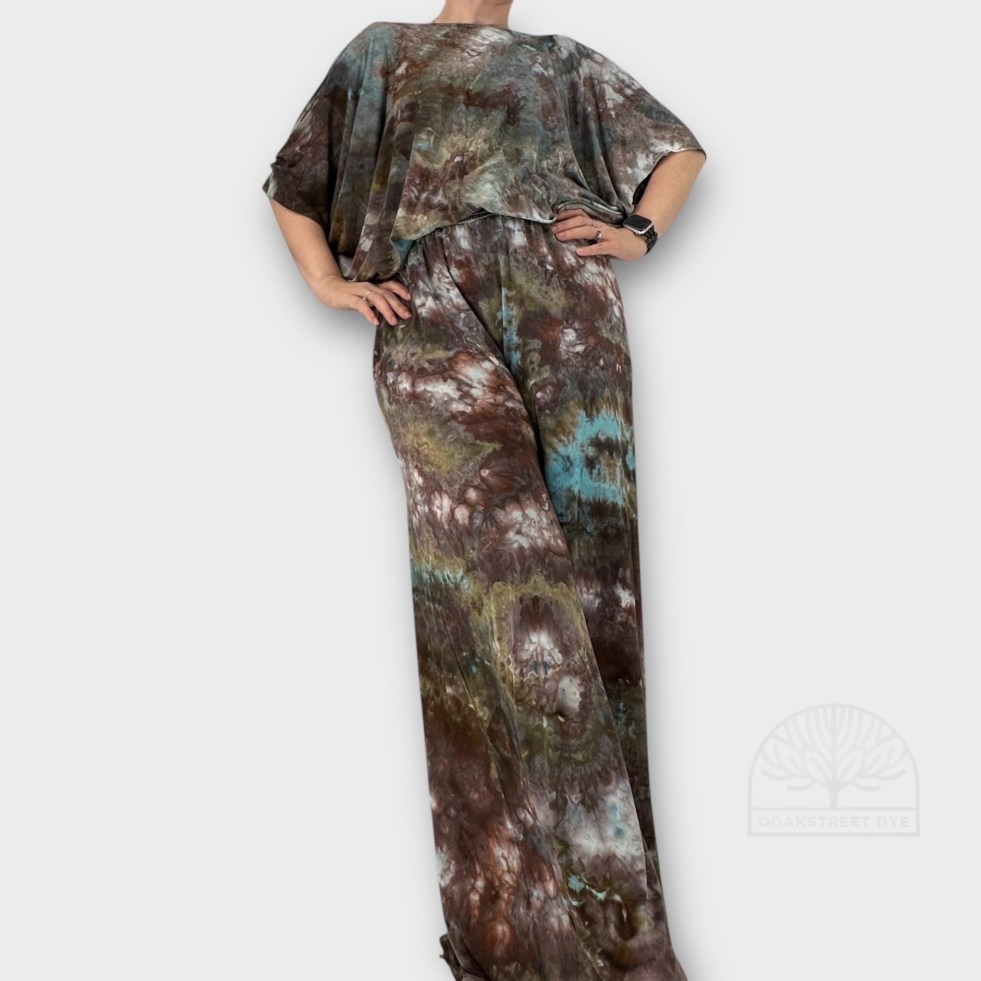 Bronzite tie-dye palazzo pant and twist top set in earthy bronze, charcoal, olive, and subtle blue tones